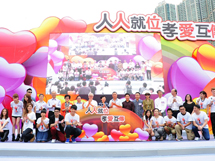 Family Council Member Mr Ivan Yiu, Family Council Member Dr Wong Chung Kwong, Mrs Stella Lau, Prof Alfred Chan, Mr Robert Chow, Mrs Carrie Lam, Mr Bunny Chan, Mr Raymond Young, Mr Roy Tang, Ms Sally Yip, Member of Central Policy Unit Prof Wong Chack Kie and Family Council Member Dr Pang King Chee took a group photo with singers and DJs.
